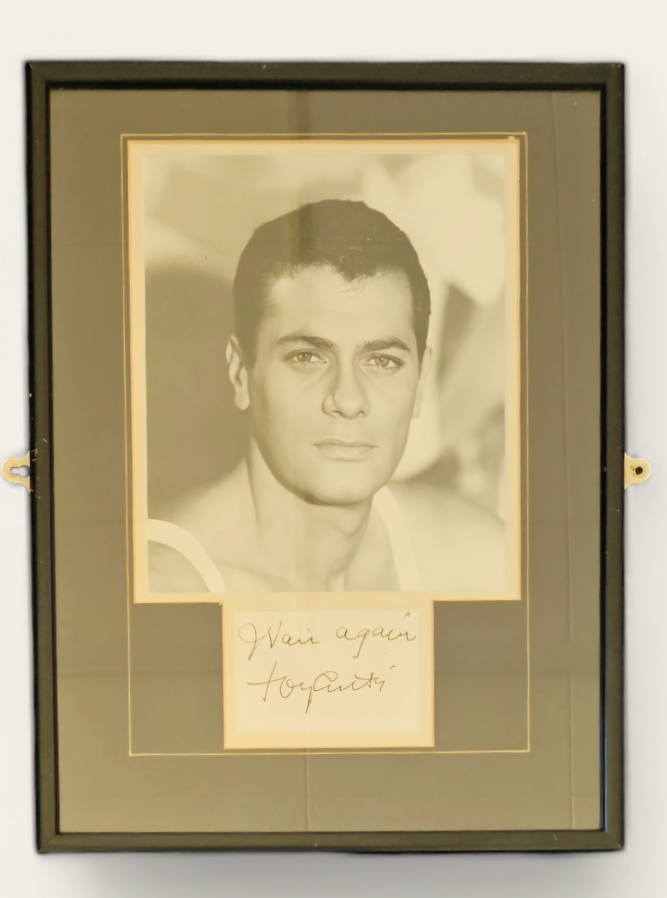 Tony Curtis signature piece, with black and white photo. Framed. Measures 11 inch by 16-inch appx.