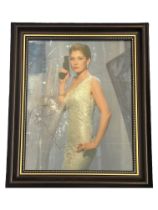 Rosamund Pike signed 10x8 Inch Colour Photo 'Jame Bond'. In Brown Framed overall size 12x10 Inch.