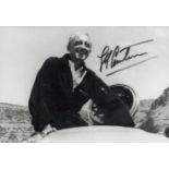 Jacques Cousteau signed 5x3.5 inch black and white photo. Good Condition. All autographs come with a