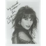 Susan Lucci signed 10x7 inch black and white photo. Good Condition. All autographs come with a