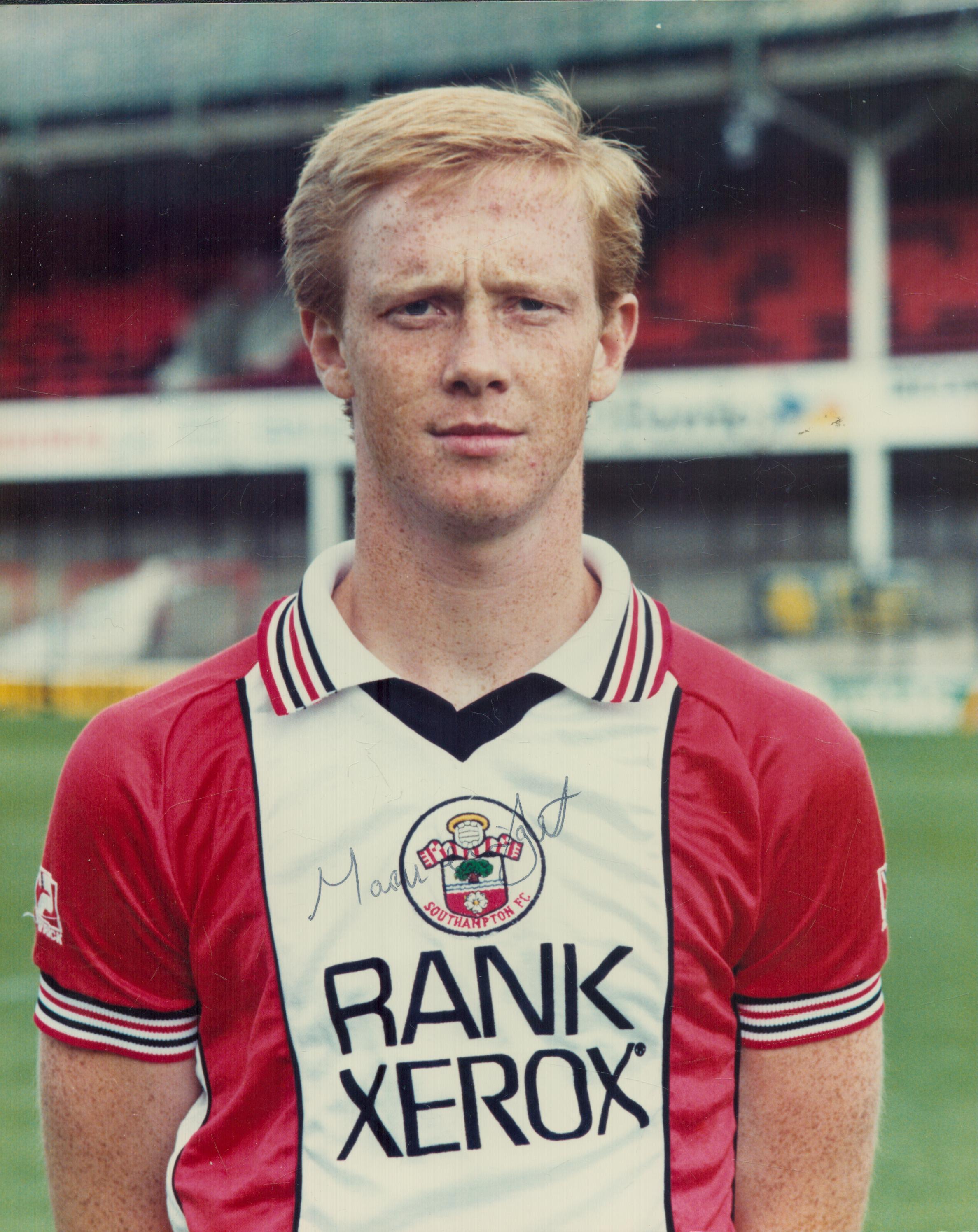 Mark Wright signed 10x8 inch colour photo pictured during his playing days with Southampton F.C.