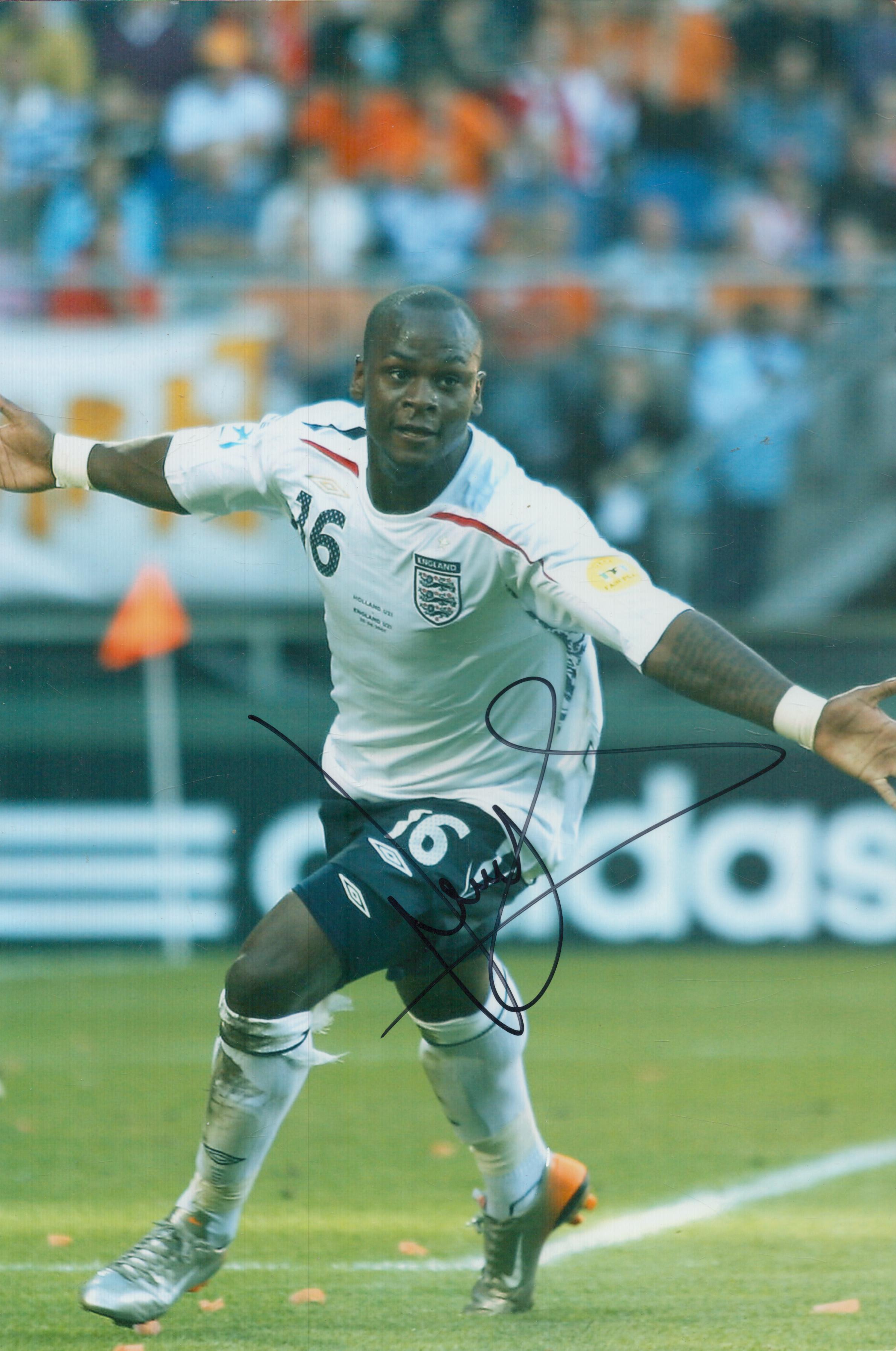 Leroy Lita signed 12x8 inch colour photo pictured in action for England U21's. Good Condition. All
