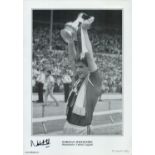 Norman Whiteside (Man Utd) signed 16.5 x 12 inch black and white print. Signed in black ink. Good