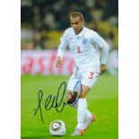 Ashley Cole signed 10x8 inch colour photo pictured in action for England. Good Condition. All