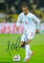 Ashley Cole signed 10x8 inch colour photo pictured in action for England. Good Condition. All