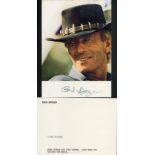 Paul Hogan signed 7x5 inch Crocodile Dundee colour photo. Good Condition. All autographs come with a