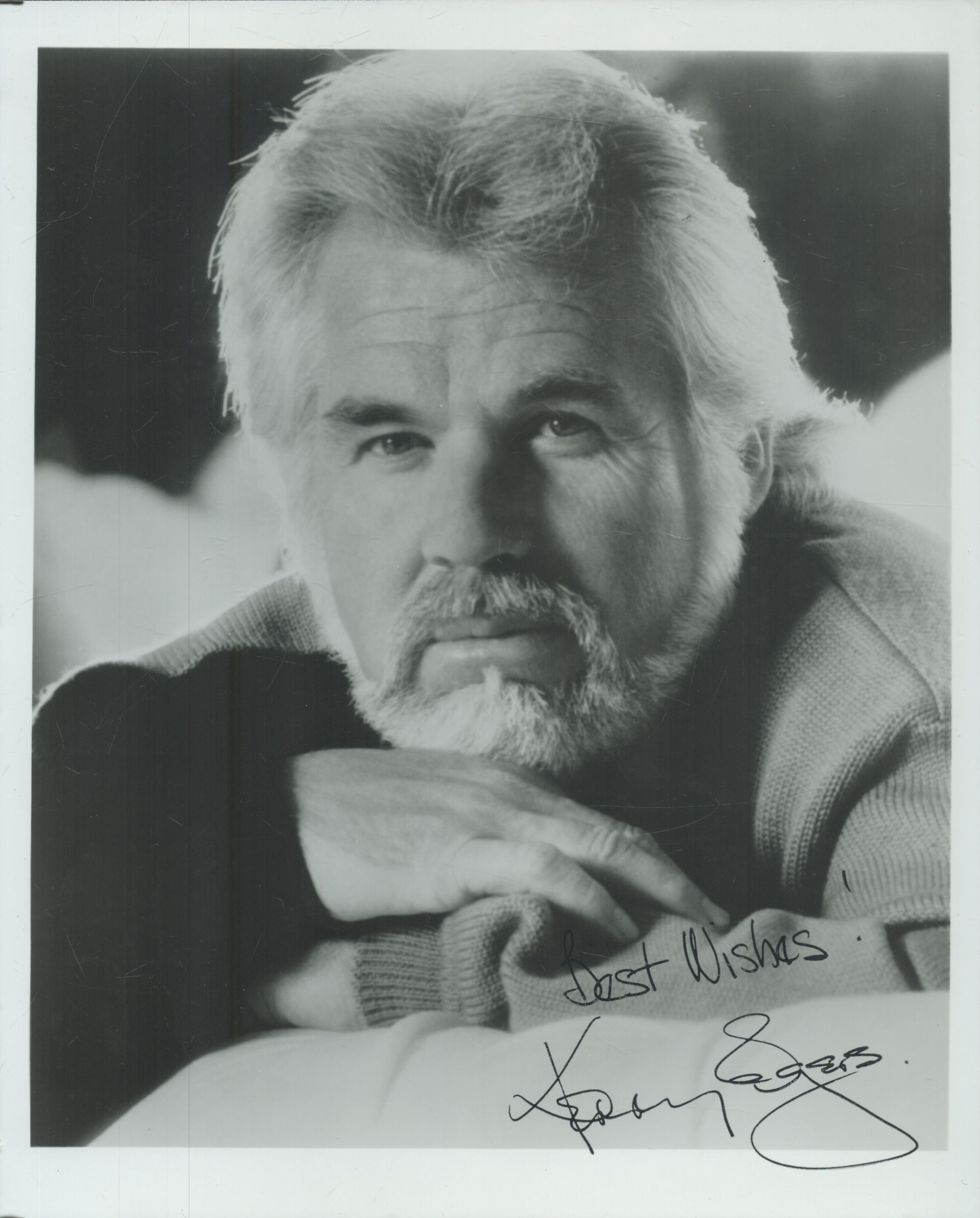 Kenny Rogers signed 10x8 inch black and white photo. Good Condition. All autographs come with a