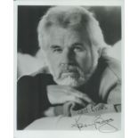 Kenny Rogers signed 10x8 inch black and white photo. Good Condition. All autographs come with a
