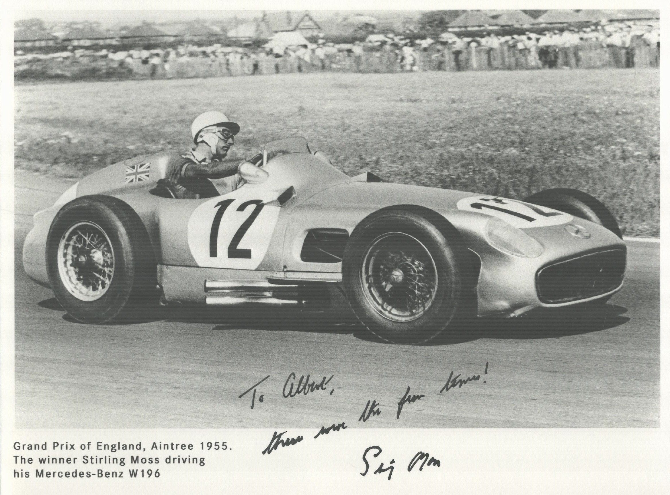 Stirling Moss signed 8x6 inch Grand Prix of England Aintree 1955 black and white photo. Dedicated.