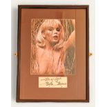 Stella Stevens signature piece with colour photo. Framed. Measures 12 inch by 16-inch appx. Good