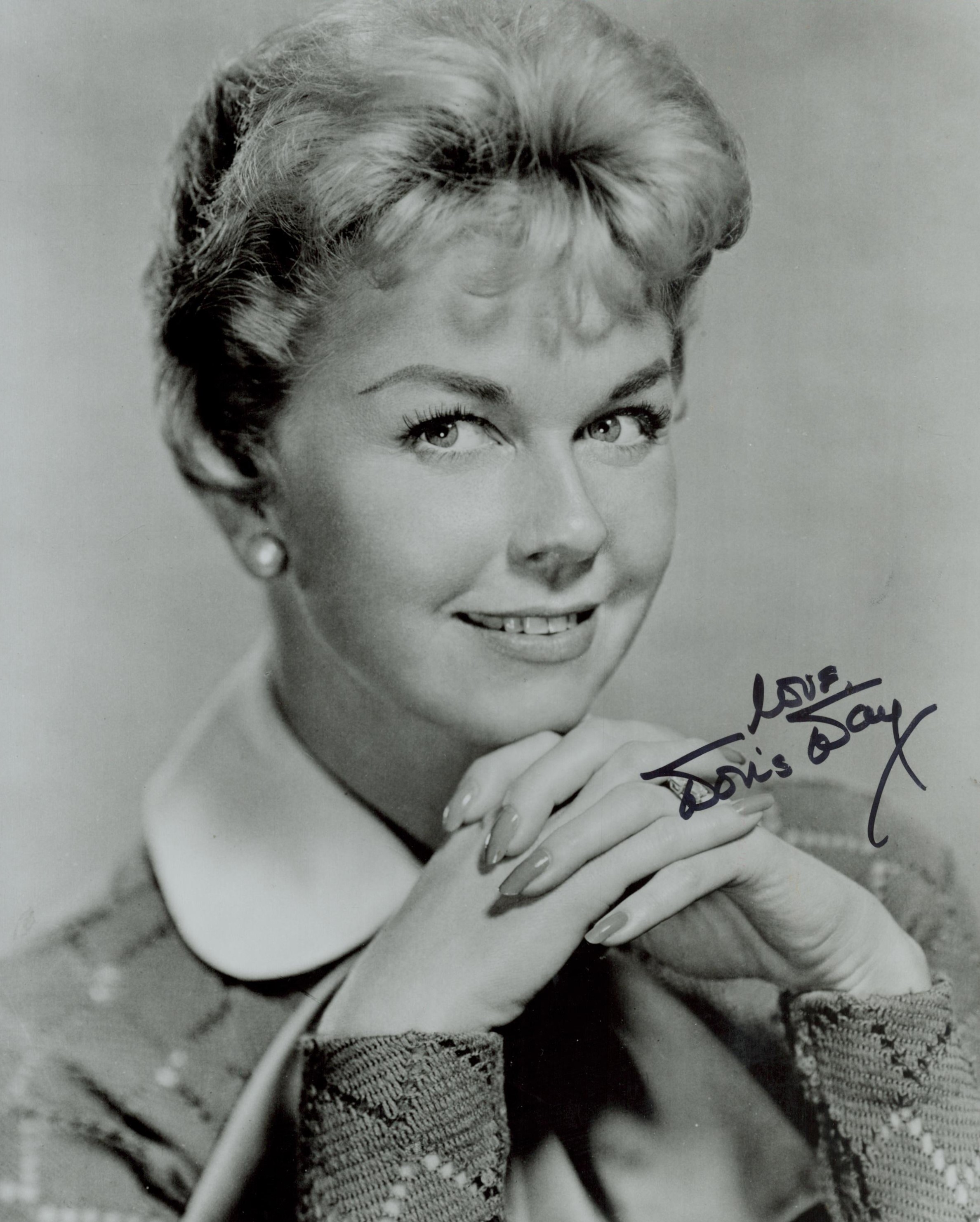 Doris Day signed 10x8 inch black and white photo. Good condition. All autographs come with a