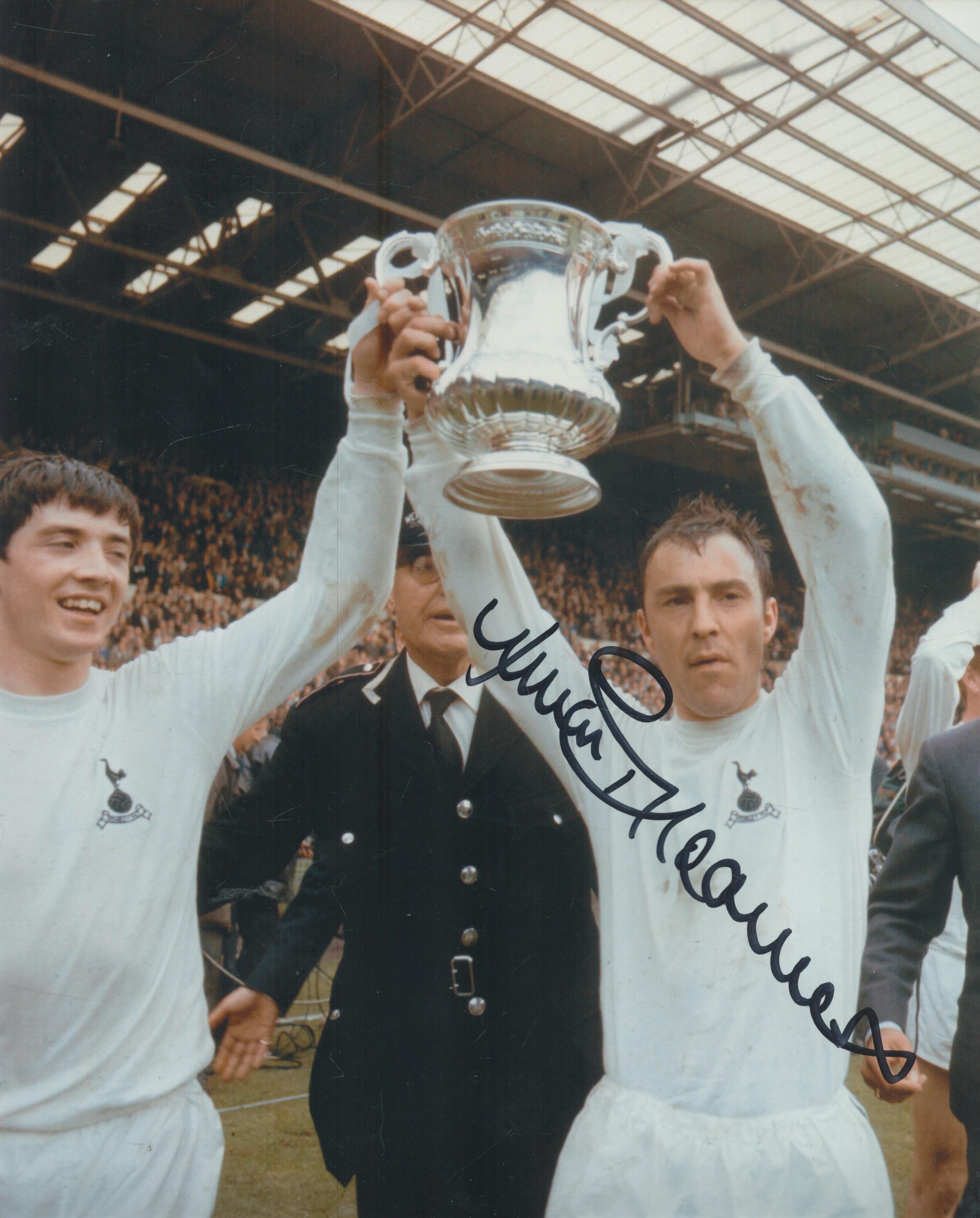 Jimmy Greaves signed 10x8 inch colour photo pictured lifting the FA Cup during his time with