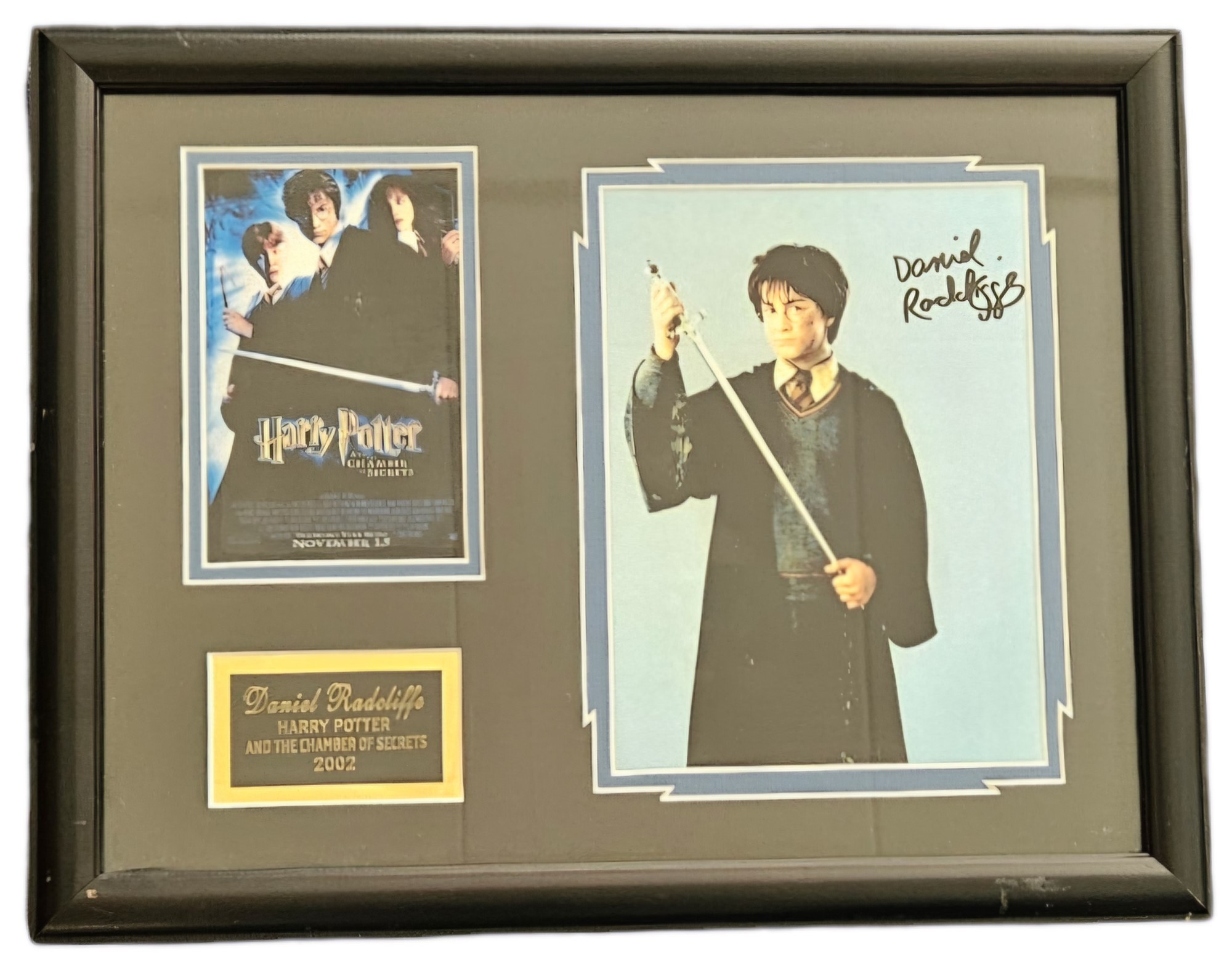 Daniel Radcliffe signed Harry Potter photo. Framed and mounted alongside another photo and name