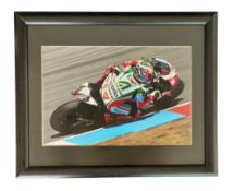 Max Biaggi 16x12 inch framed and mounted colour photo. Unsigned. Good condition Est.