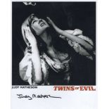 Twins of Evil hammer horror movie 8x10 B&W photo signed by actress Judy Matheson. Good Condition.