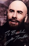 John Travolta signed 6x4 inch black and white photo. Dedicated. Good condition. All autographs