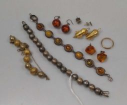 A pair of wax filled ear pendants with no fittings, tested to at least 18ct gold, and a wax filled