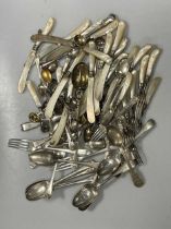 A set of silver tined and bladed and mother of pearl handled fruit eaters (12 x knives and 11 x