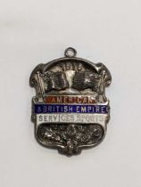 A rare First World War armed services athletics medal, commemorating the American and British Empire