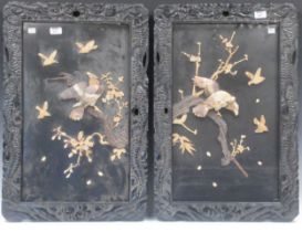 A pair of Japanese bone and mother of pearl inlaid panels with eagles circa 1900, 73 x 48cm