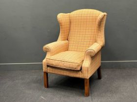 Wing back armchair upholsterd in hounds tooth