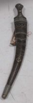 A late 19th century Yemeni Jambiya dagger and scabbard, total length 50cm