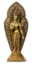 A Tibetan gilt bronze standing figure of Tara, 20th century,