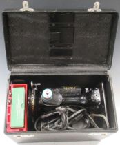 A Singer 221K sewing machine, boxed with some accessories and photocopy instructions