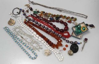 A bakelite bead necklace, together with a selection of other beads