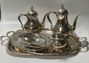 A large collection of silver plated items including two large trays, a four piece tea service,