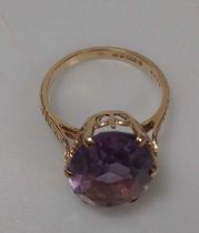A hallmarked 9ct gold citrine pendant and a hallmarked 9ct gold amethyst ring, gross weight 12g,