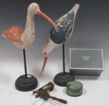 Two painted wooden decorative wading bird figures on bases, largest 40cm high