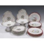 Twelve Royal Worcester fish plates with scarlet and gilt borders, date mark for 1998 and, a