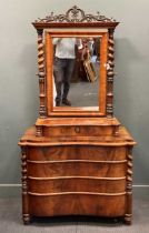 A 19th century Continental dressing chest, with framed mirror and drawer surmounting a chest of four