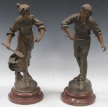 A pair of early 20th century spelter figures of tennis players, signed Louis Moreau, 49cm high The