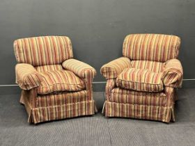 Two Edwardian deep armchairs, both upholstered in a stripped fabric in white, grey and reds, one