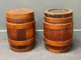 A pair of oak barrels with pine tops, early 20th century, one with a part glazed top, 48cm high