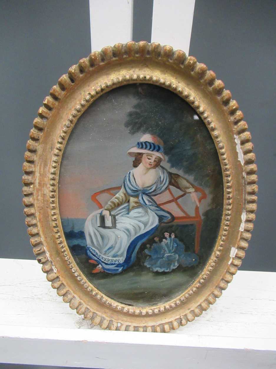 Reverse glass painting of a lady seated on a garden bench