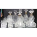 Six glass decanters with silver collars another decanter all with presentation inscription, a set of