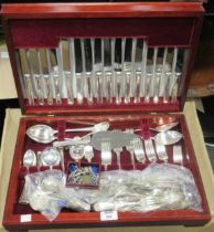 A canteen of Sheffield silver plated flatware (qty) seven assorted silver hallmarked spoons, a small