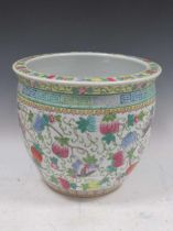 A Chinese porcelain jardiniere, 20th century, with yellow ground decorated with blossoms,