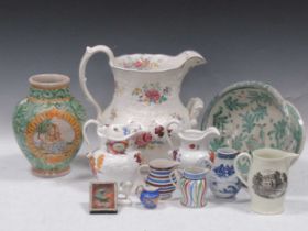 Decorative jugs and animal ornaments including animals blue jug has old restoration to the rim,