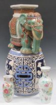 A single modern Chinese ceramic stool in the form of an Elephant, the celadon coloured body draped