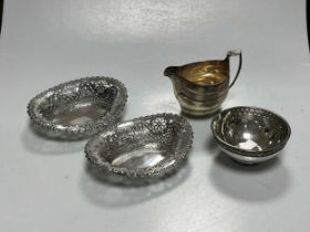 A collection of silver including a George III cream jug, mark of Peter & Ann Bateman, an Arts &