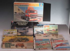 A collection of vintage Airfix and other similar model kits