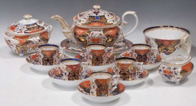 A Derby tea and coffee service circa, 1825-30, decorated in the Old Witches pattern in red, green,