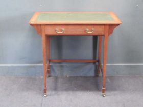An Edwardian small leather topped writing table, 74 x 83 x 53cm, together with an Edwardian nest