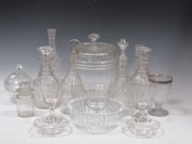 A mixed group of glassware to include decanter bottles, biscuit barrel, lidded jar, metal-rimmed