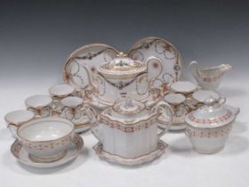 A Spode tea and coffee service, circa 1810, painted en grisaille with swags of flowers and leaves,