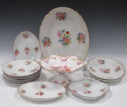 Three Coalport platters, circa 1840, painted with flowers within gilt rims; an Anstice, Horton and